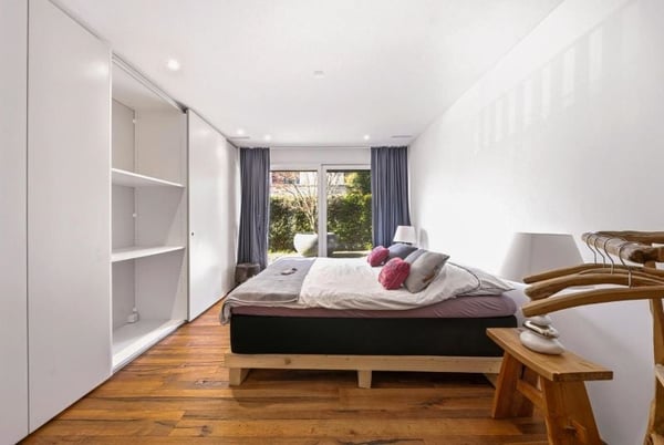 Modernes 5-Zimmer-Einfamilienhaus mit Pool und Seeblick in Greppen 12