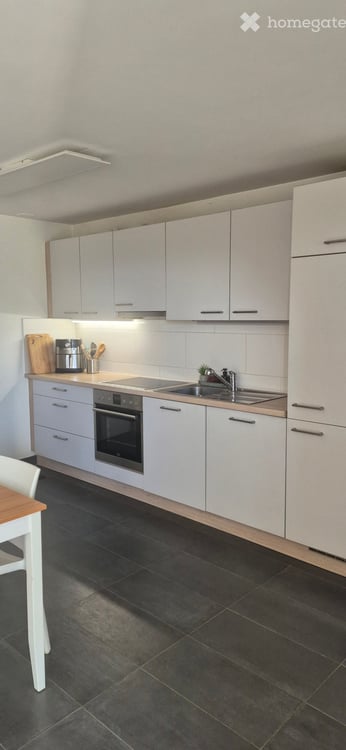Grosse 2.5-Zimmer-Wohnung mit eigenem Garten, Fernsicht und zusätzlichem Nutzzimmer 12