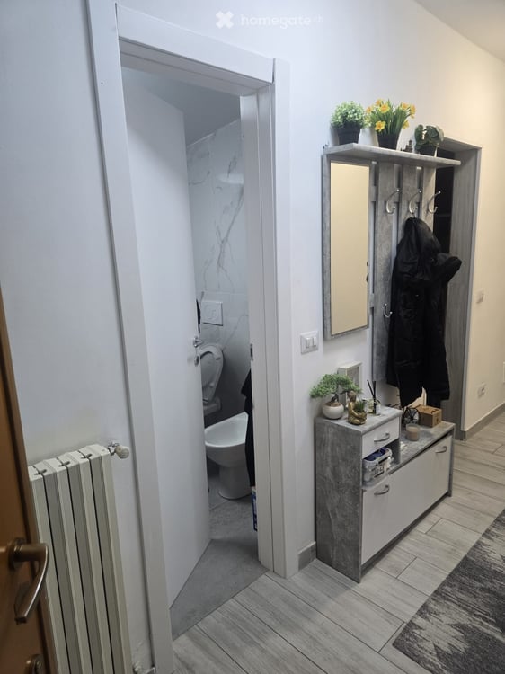 Appartamento ristrutturato con balcone e vista panoramica a Induno Olona 1