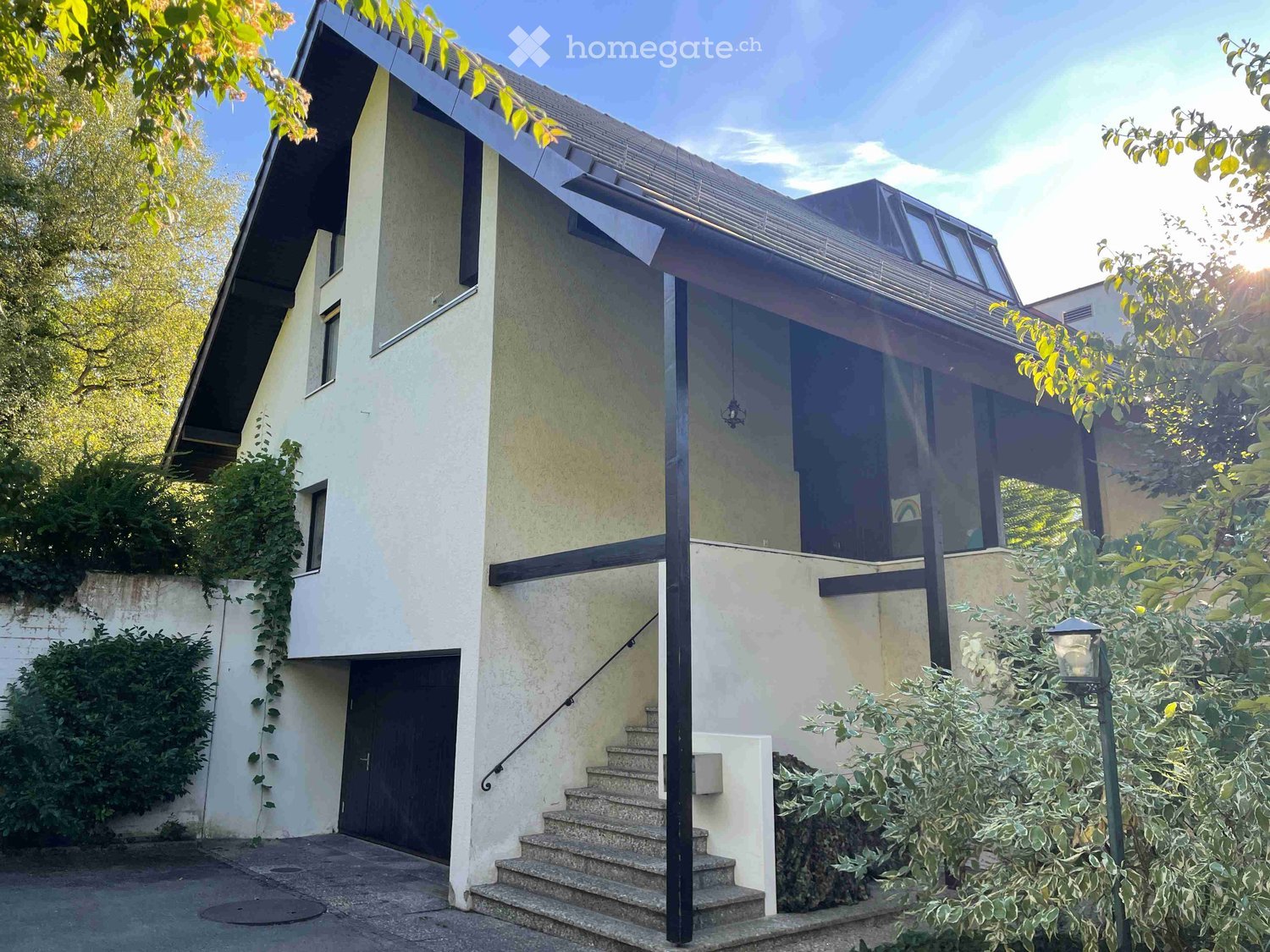 two story house, white exterior, black roof, steps, garage, black railings