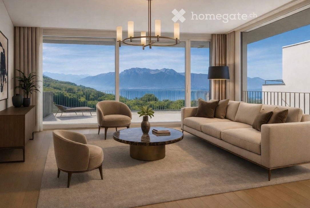 Modern living room with large windows offering a scenic mountain and lake view. Features a beige sofa, coffee table, armchairs, floor lamp, and decorative vases.