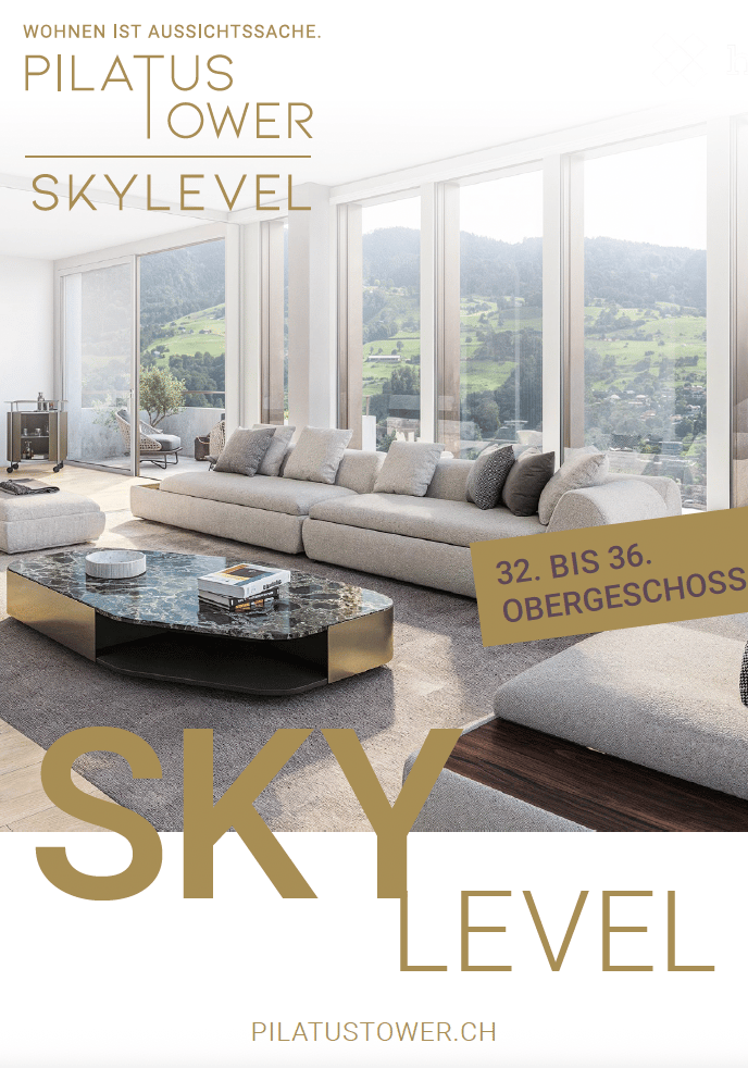 Modern living room with large windows offering a scenic view, featuring a sectional sofa, coffee table, ottoman, and side table.