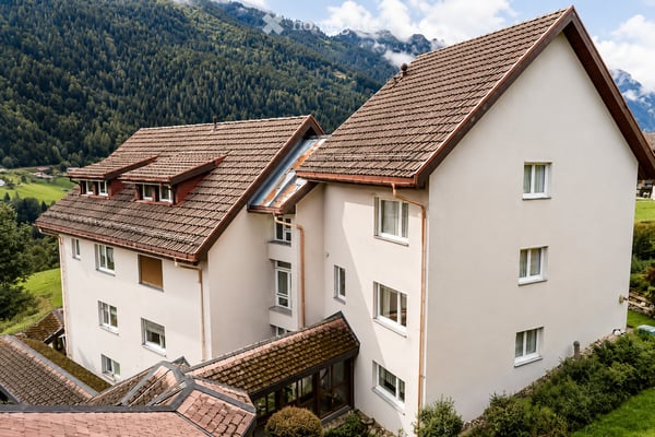 Charmantes Renditeobjekt: 29 Wohnungen + 2 Reiheneinfamilienhäuser mit Bergpanorama 14