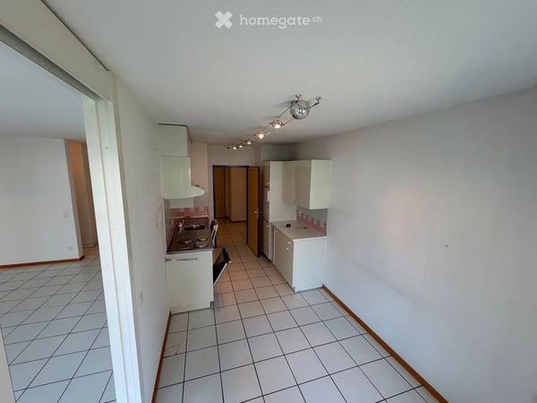 Luminoso appartamento di 2.5 locali con ampio balcone in posizione strategica 5