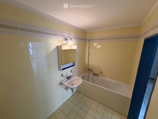 Luminoso appartamento di 2.5 locali con ampio balcone in posizione strategica 10