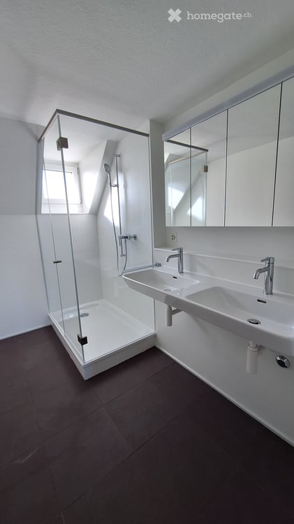 Helle 4-Zimmer-Dachgeschosswohnung mit Seesicht im Kreis 6 10