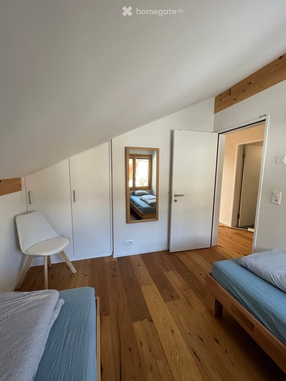 Charming 4.5-Room Attic Apartment with Stunning Mountain Views in Flims 10