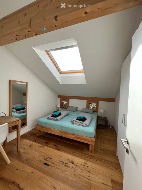 Charming 4.5-Room Attic Apartment with Stunning Mountain Views in Flims 16