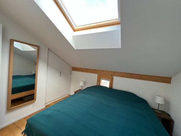 Charming 4.5-Room Attic Apartment with Stunning Mountain Views in Flims 8