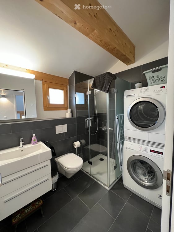 Charming 4.5-Room Attic Apartment with Stunning Mountain Views in Flims 12