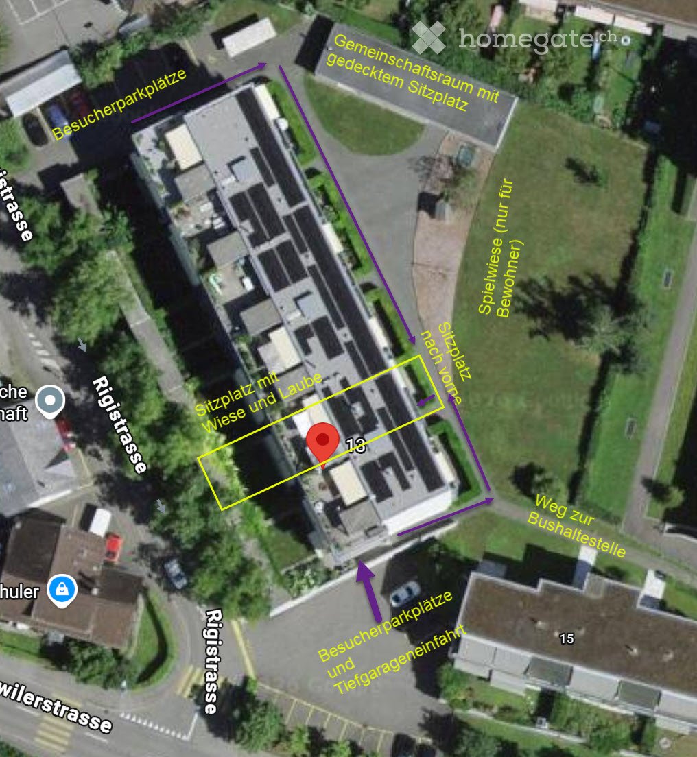 Aerial view of a building complex with labeled areas including parking, seating areas, and pathways.