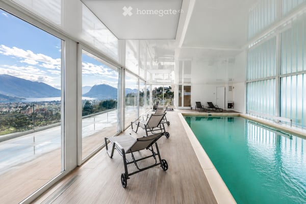 Porza Via Tesserete – 3.5 locali panoramico all’ultimo piano con terrazza, piscina e area wellness