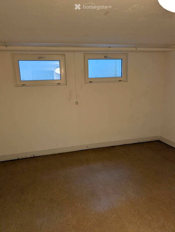 Vermietetes Anlageobjekt mit Gartensitzplatz, grossem Keller und Tiefgaragenplatz in Bonstetten 12