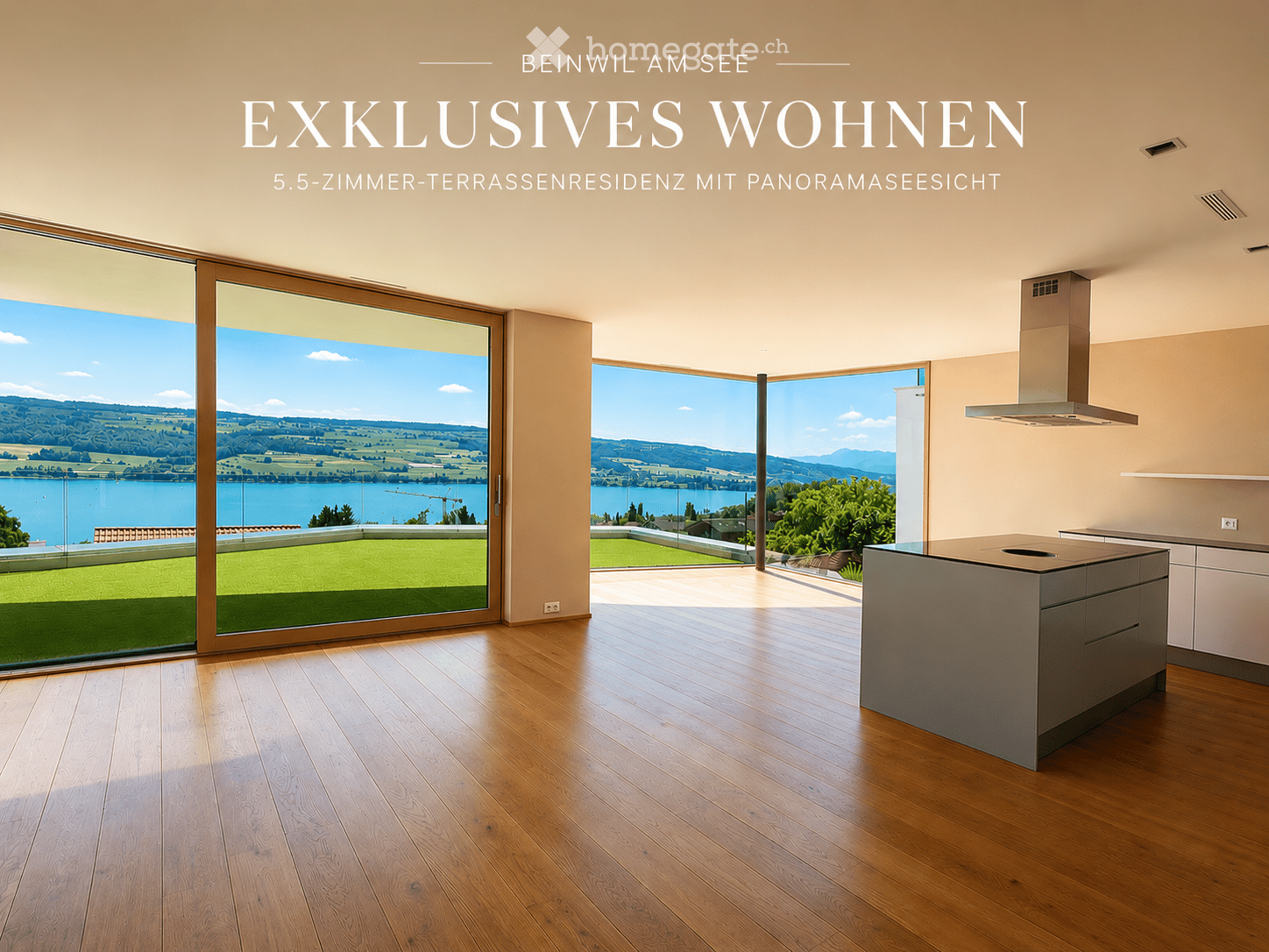 Modern kitchen with wooden flooring, large windows offering a scenic lake view, and a central kitchen island.