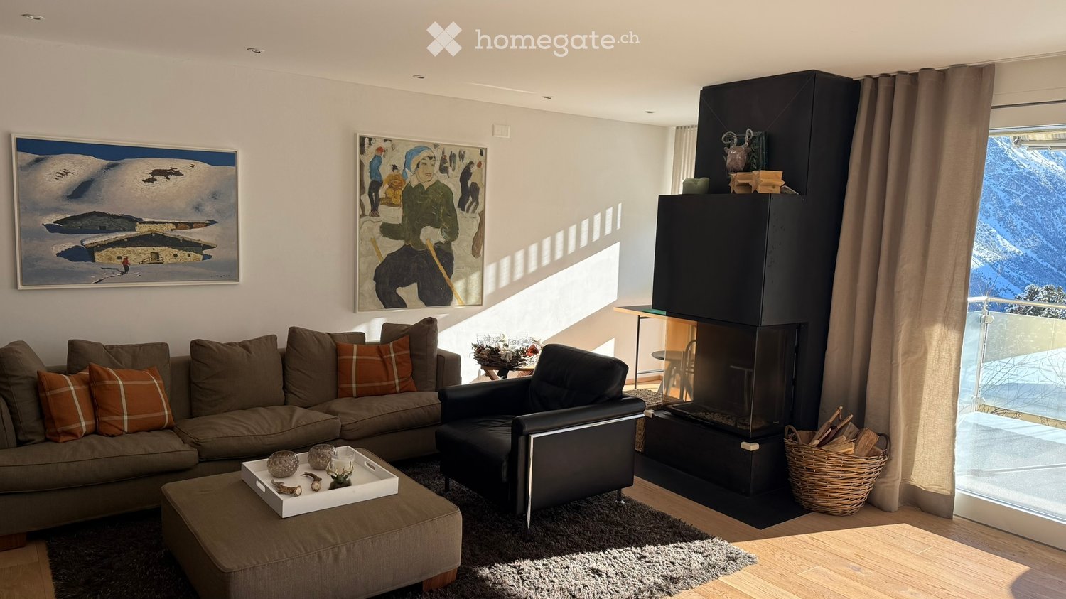 living room, fireplace, black leather sofa, beige sofa, large windows, floor lamp, coffee table, armchair