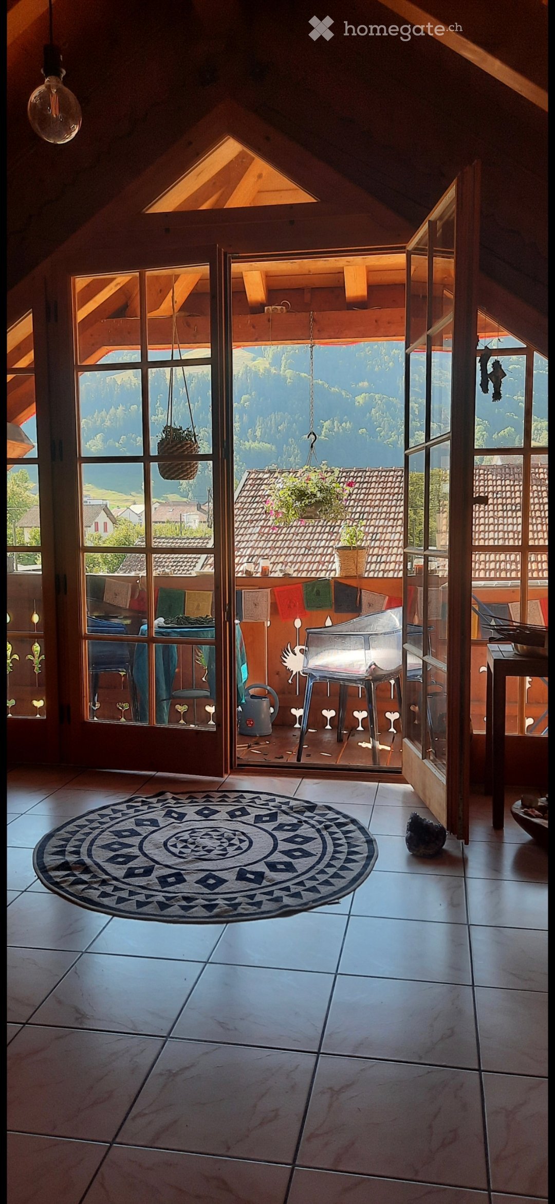 {"visible_features": ["View"], "type": "Furnished Room", "objects": ["rug", "chair", "table", "stool", "stool", "stool", "stool", "stool", "stool", "stool", "stool", "stool", "stool", "stool", "stool", "stool", "stool", "stool", "stool", "stool", "stool",