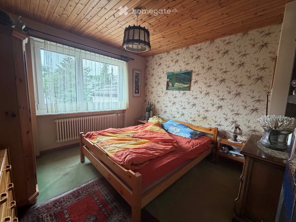 5.5-Zimmer Einfamilienhaus mit Einliegerwohnung sehr zentral gelegen mit Pool 9
