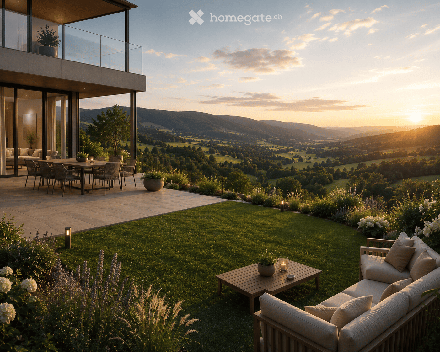 Garden with a modern outdoor seating area, including a sofa, coffee table, and dining set, surrounded by lush greenery and a scenic valley view.