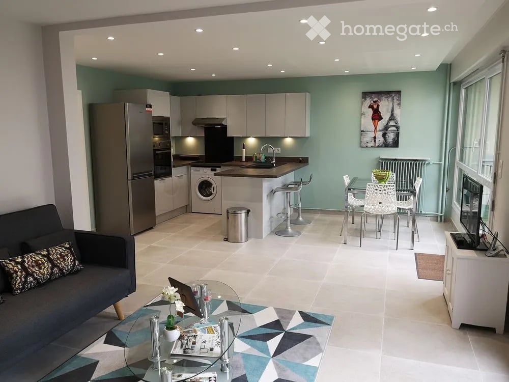 {"visible_features": [], "type": "Furnished Room", "objects": ["sofa", "coffee table", "laptop", "stool", "chair", "table", "fridge", "microwave", "oven", "washing machine", "stool", "stool", "stool", "stool", "stool", "stool", "stool", "stool", "stool",