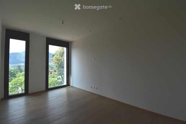 Appartamento con terrazza a Davesco-Soragno – Moderno e luminoso 7