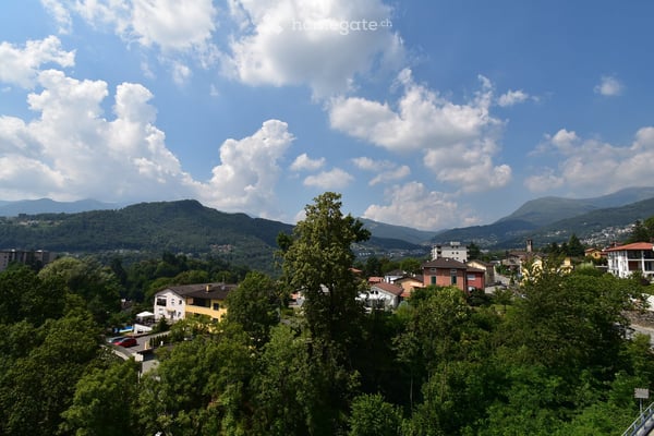 Appartamento con terrazza a Davesco-Soragno – Moderno e luminoso 11