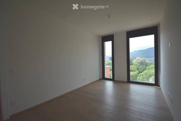 Appartamento con terrazza a Davesco-Soragno – Moderno e luminoso 8