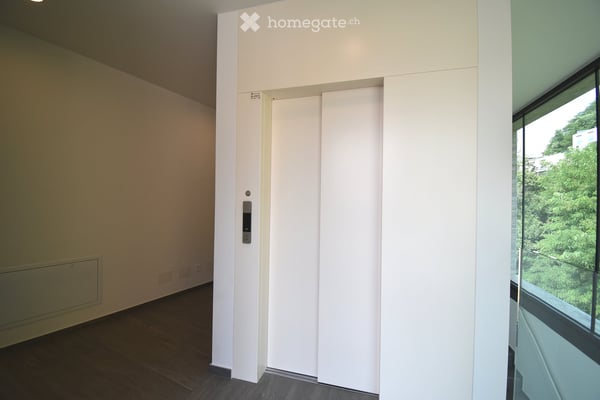 Appartamento con terrazza a Davesco-Soragno – Moderno e luminoso 16