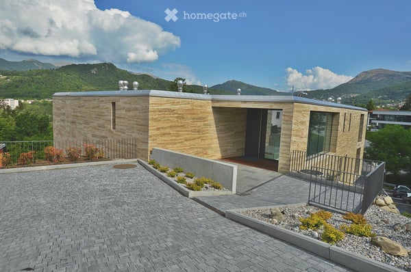 Appartamento con terrazza a Davesco-Soragno – Moderno e luminoso 18