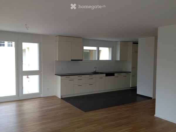 Moderne Gartenwohnung mit gedecktem Sitzplaz in Seenähe
