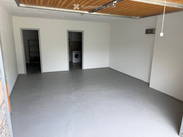 Ampio appartamento di 5 locali con una splendida vista a Porza 10