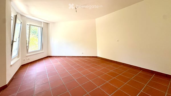 Sonnige 2.5-Zimmer-Gartenwohnung an zentraler Lage in Dornach 2