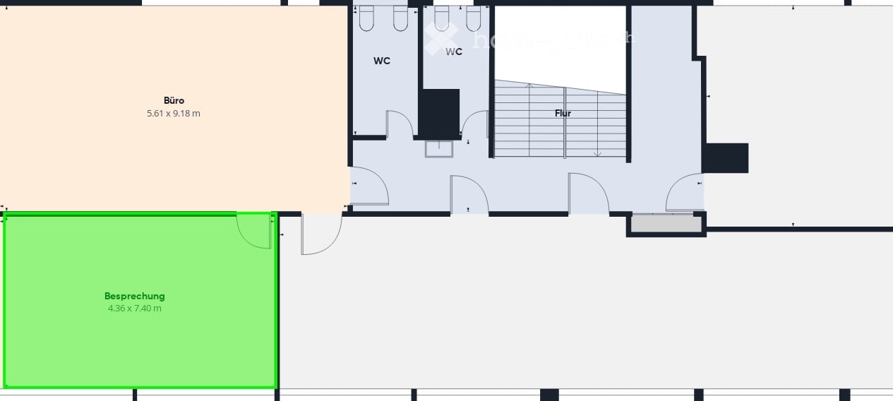 Floor plan showing a bureau (office) area, a meeting room, and two WC (restroom) spaces, with a staircase leading to another floor.