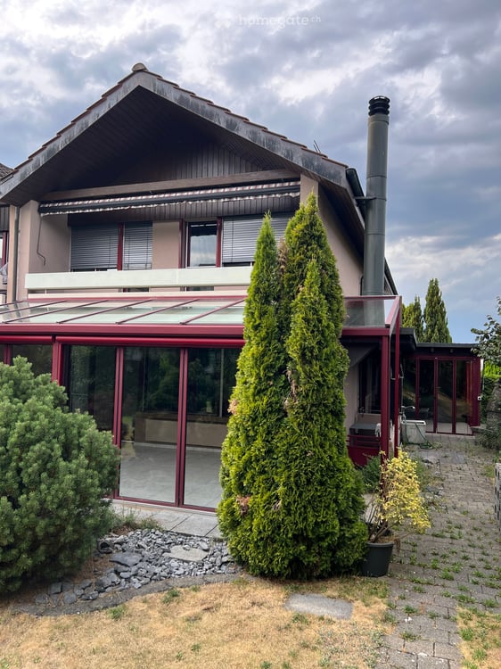 Charmantes 5.5-Zimmer-Doppelhaus mit Garten, Wintergärten und Cheminée 2