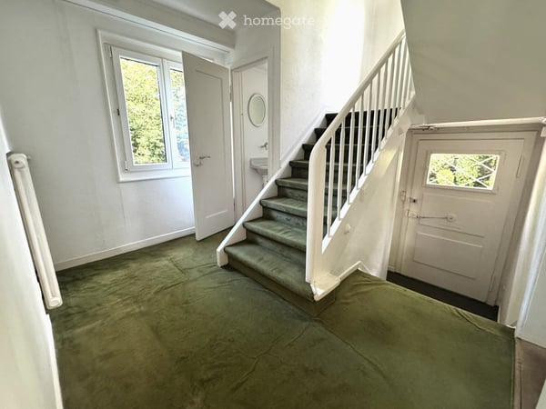 Charmante Haushälfte mit Garten und Potenzial an zentraler und ruhiger Lage in Meilen 10