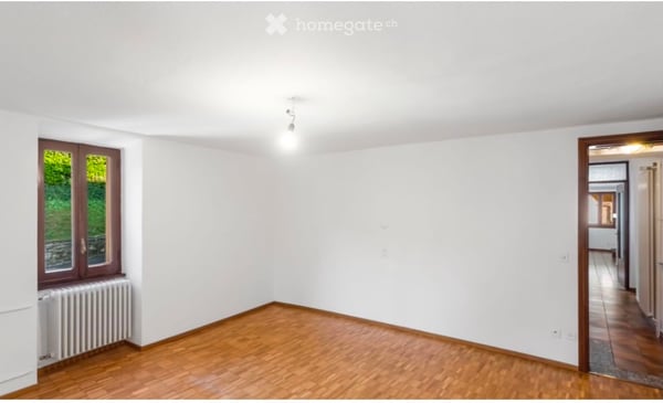 Appartamento di 4 locali con camino e balcone / loggia a Carabbia 5