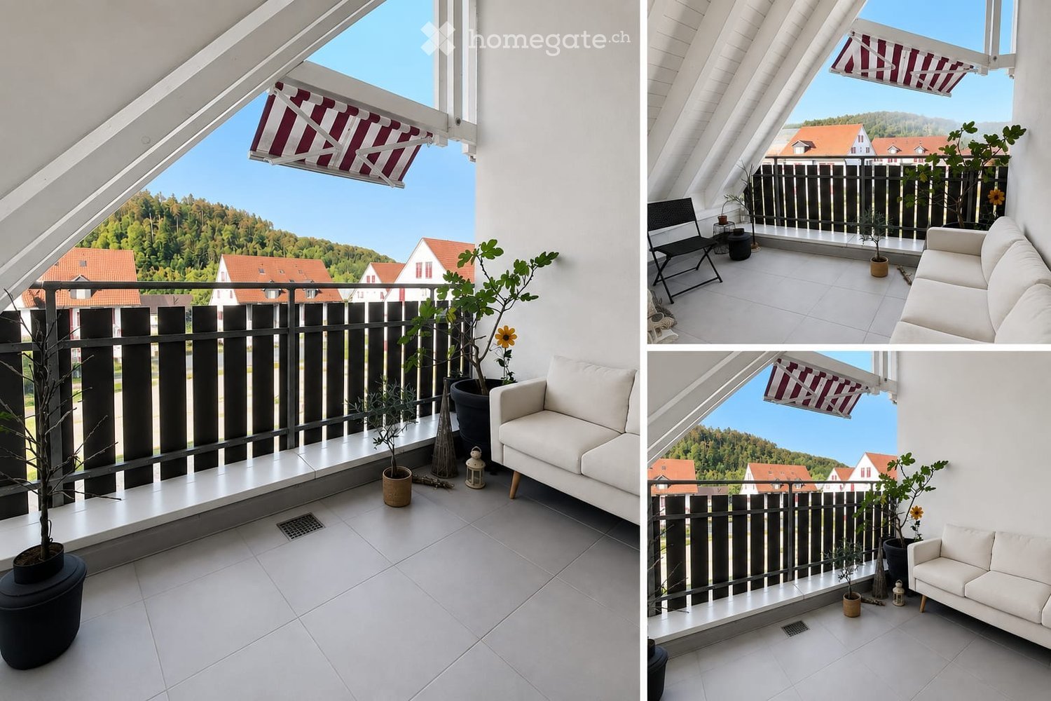 Modern balcony with white tiled flooring, black metal railing, and a scenic view of the surrounding landscape. Features a white sofa, a black folding chair, and several potted plants.