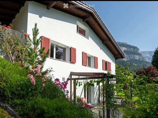 Charmantes 7.5-Zimmer-Einfamilienhaus in Flims Dorf mit herrlicher Aussicht 1