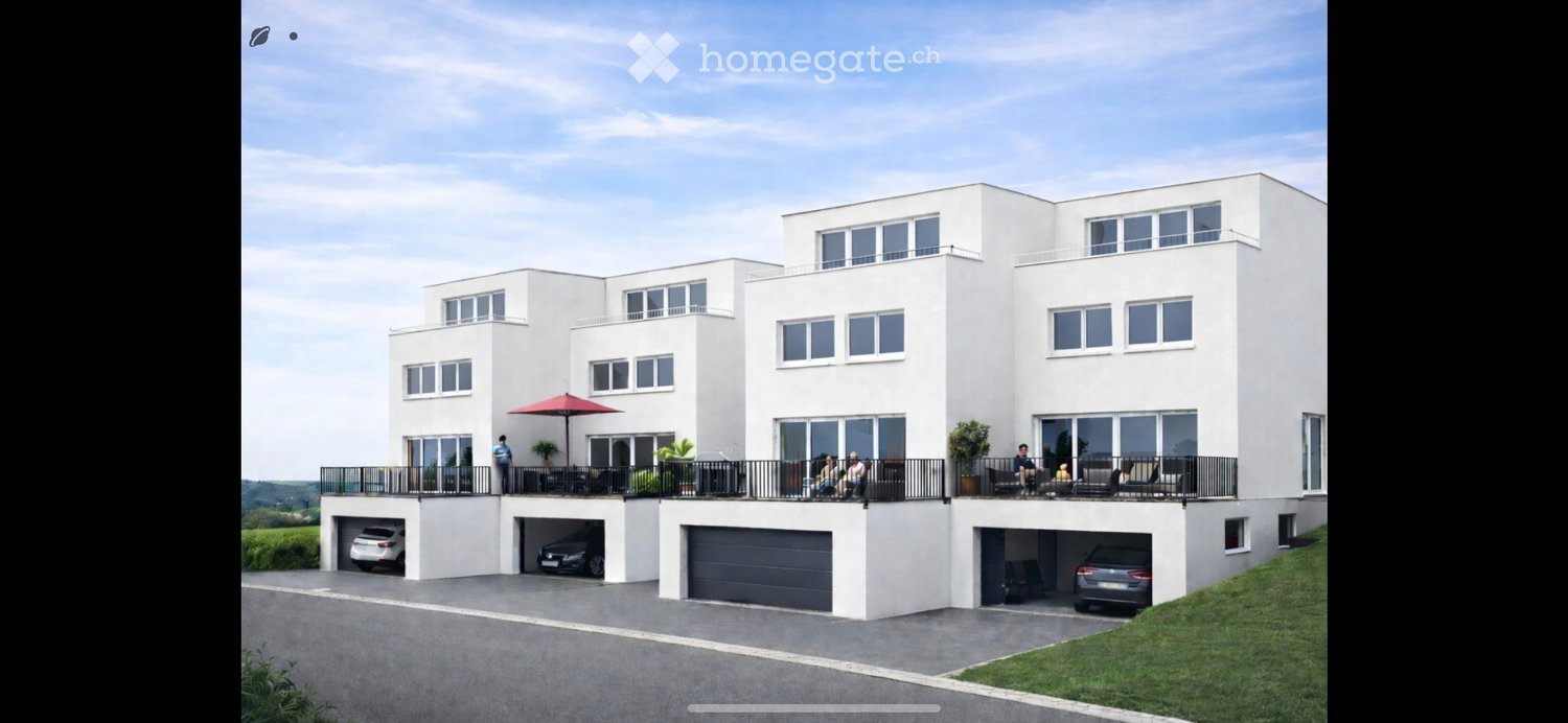 3 story house, white exterior, 3 garages, balconies, green lawn