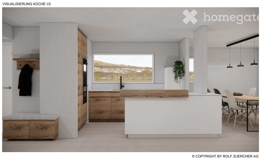 Modern kitchen with a large island, wooden cabinets, a sink, and a dining area with a table and chairs. The space features pendant lights and a view through a large window.