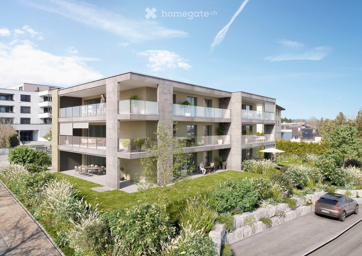 Modern multi-story residential building with balconies, greenery, and outdoor seating areas.