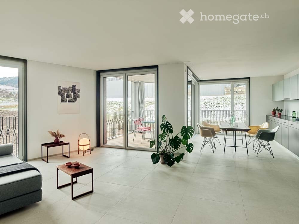 modern design, large windows, balcony, white walls, white floor, modern furniture, plants, artwork