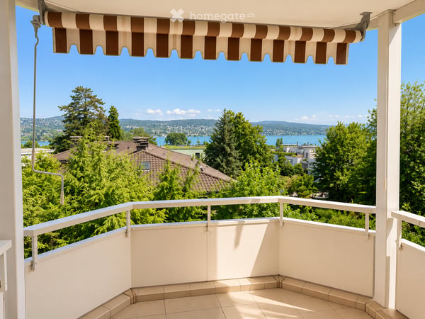 Ruhiges Penthouse mit See- und Alpenblick in Enge 1