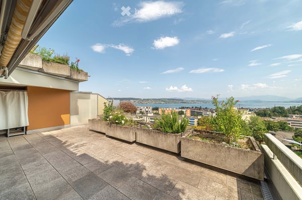 Traumhafte Terrassenwohnung mit unverbaubarer Sicht auf See und Berge 11