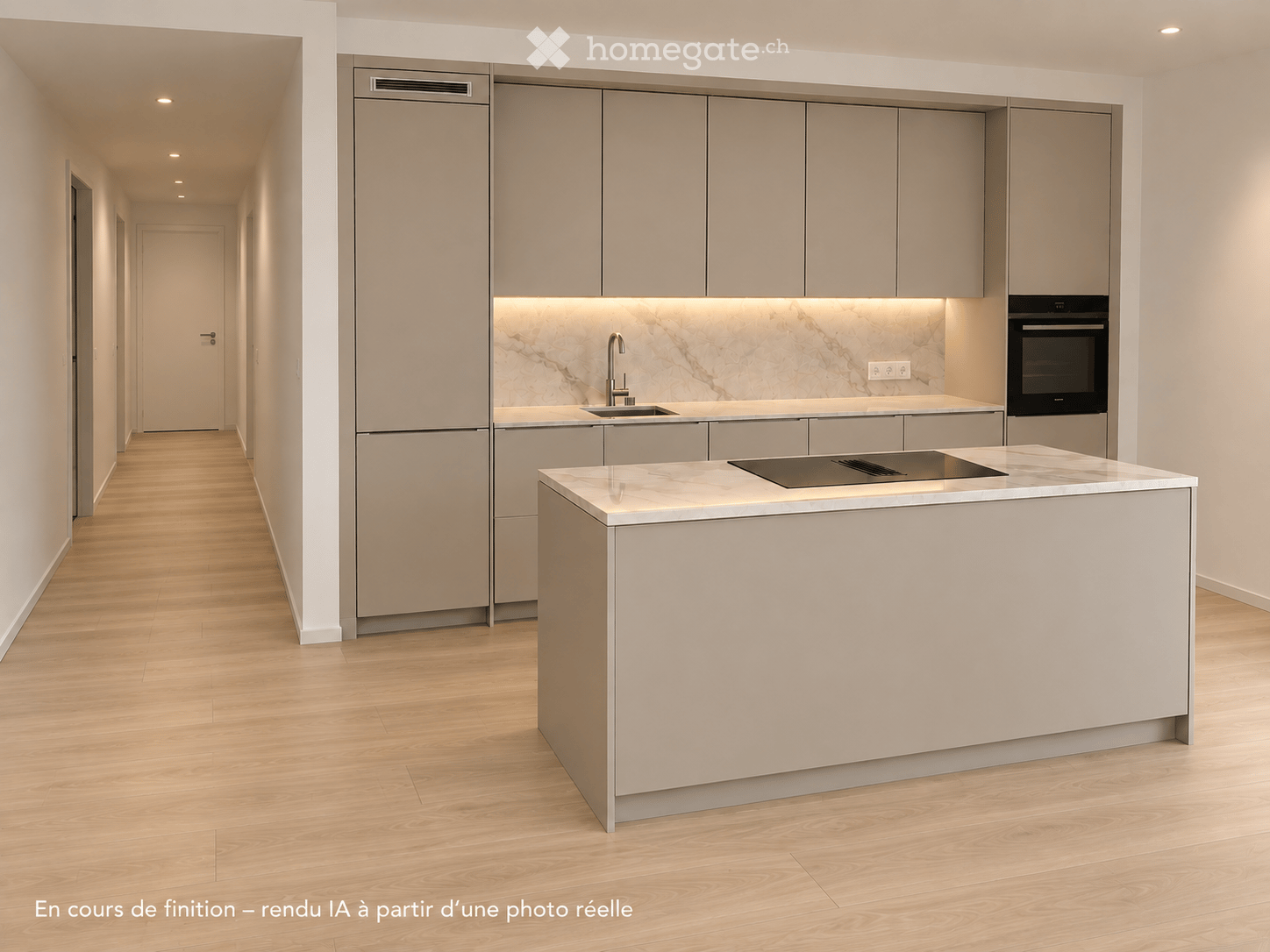Modern kitchen with light grey cabinetry, marble backsplash, island with induction cooktop, and built-in oven.