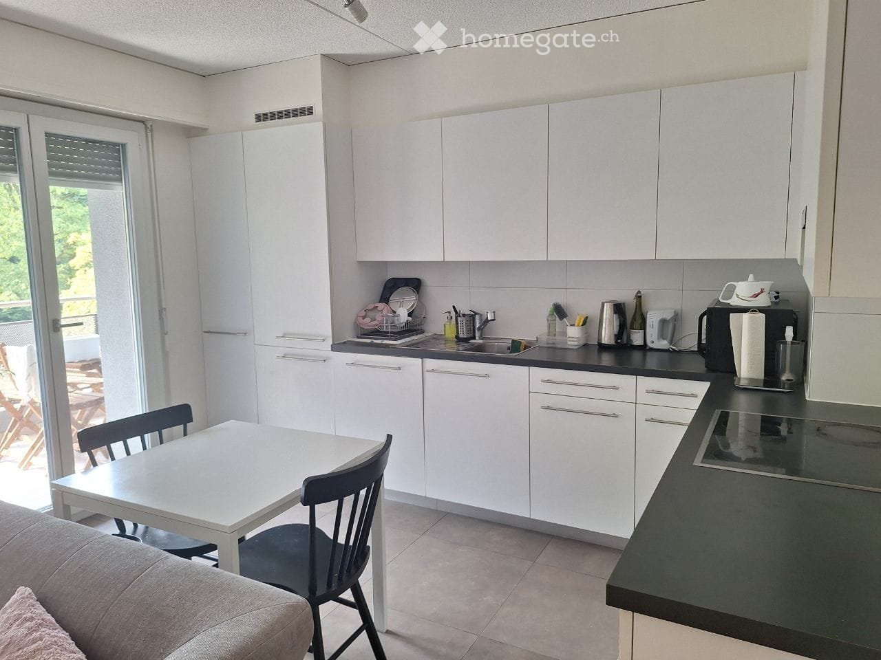 {"type": "Kitchen", "objects": ["table", "chair", "sink", "faucet", "microwave", "cupboard", "cupboard", "cupboard", "cupboard", "cupboard", "cupboard", "cupboard", "cupboard", "cupboard", "cupboard", "cupboard", "cupboard", "cupboard", "cupboard", "cupbo