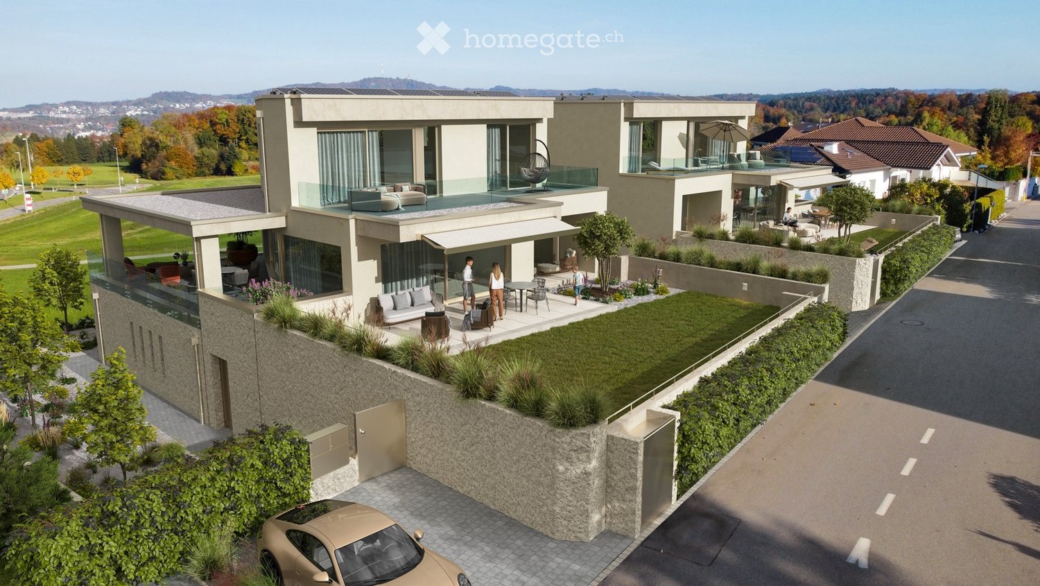 Modern two-story house with large windows, balconies, and a landscaped garden area. The house features a sleek design with a combination of stone and glass elements, surrounded by greenery and a scenic view of the landscape.