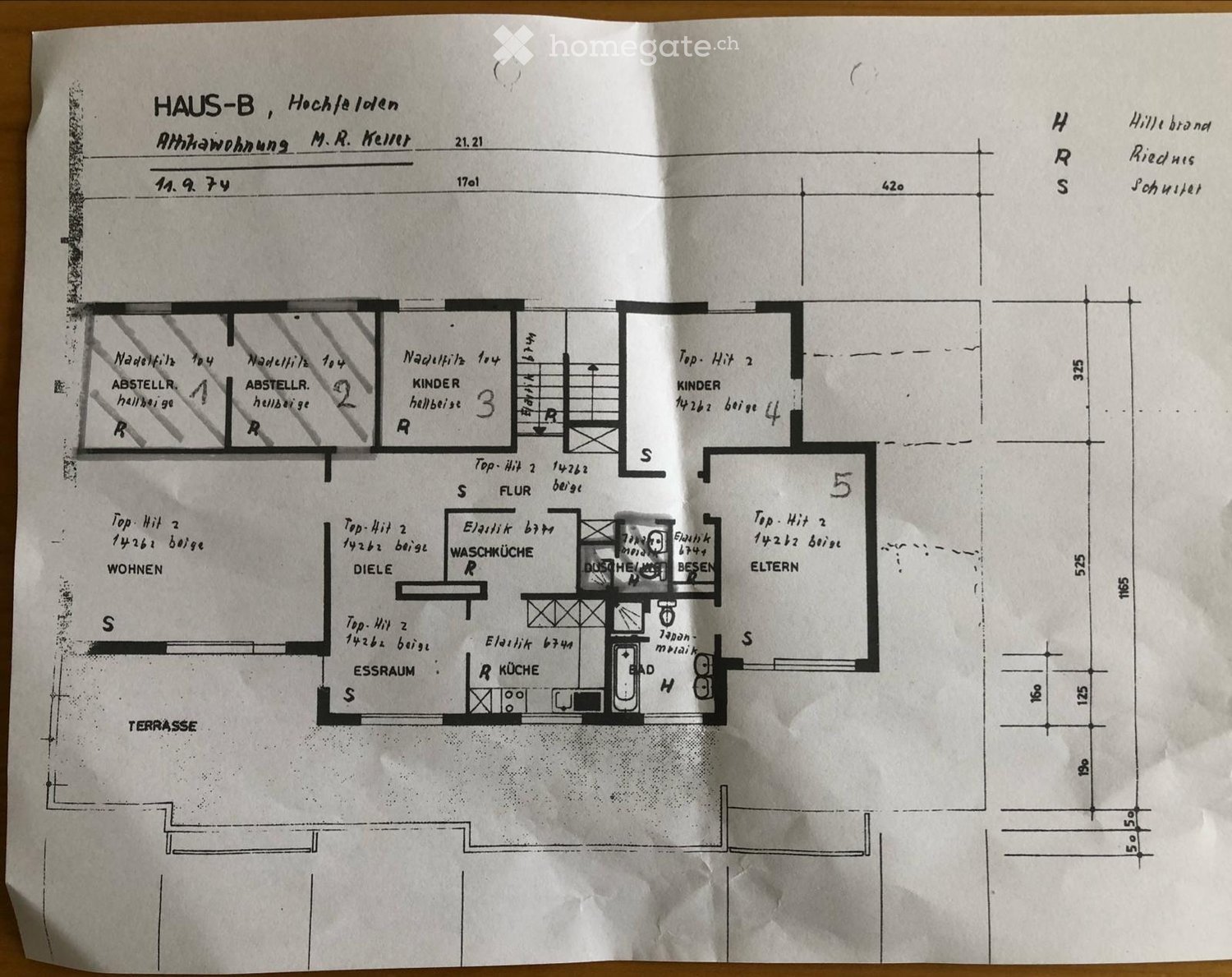 Floor plan of a house with multiple rooms including living room, kitchen, dining room, bedrooms, and bathrooms.