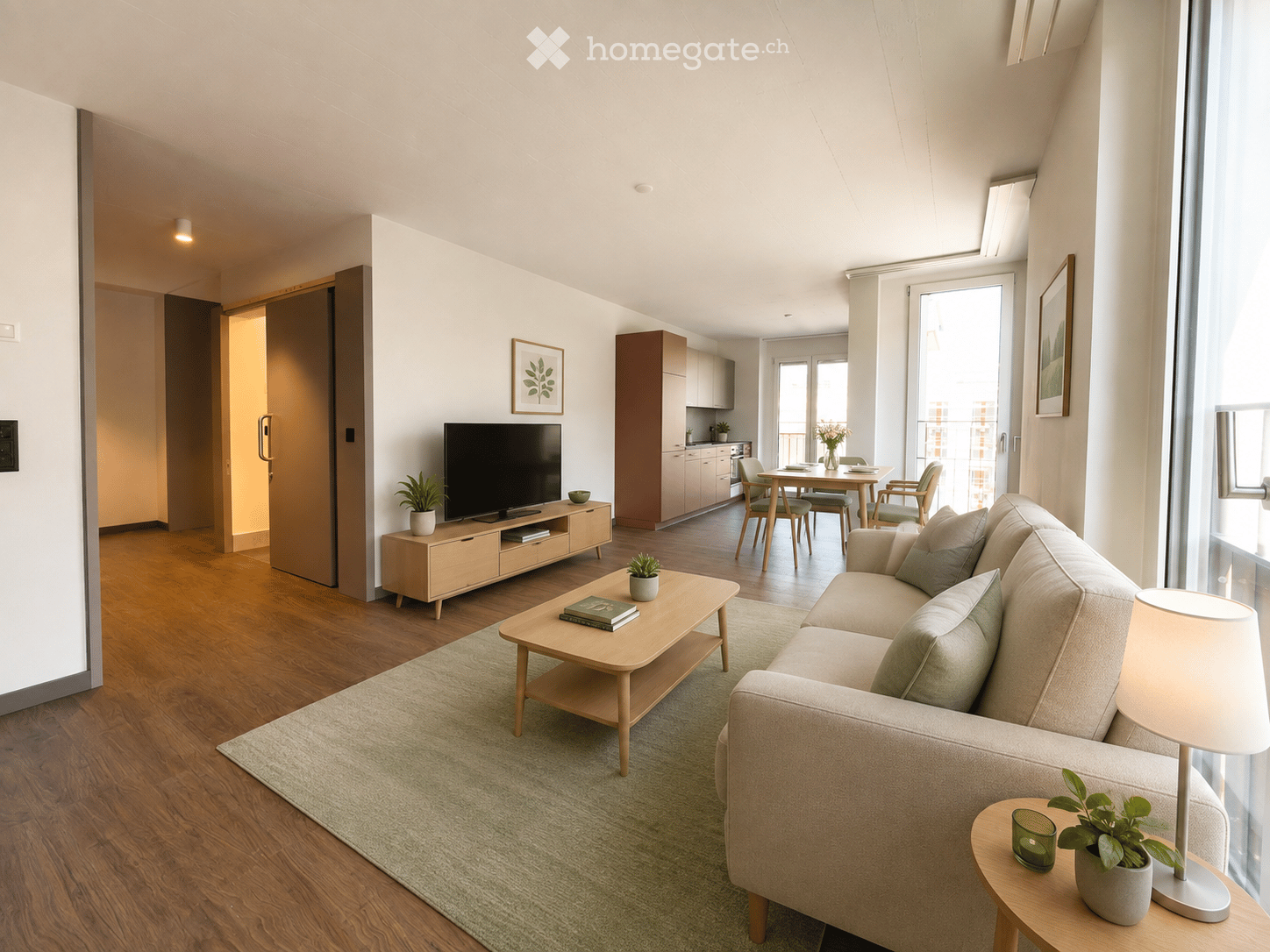 Modern living room with a light-colored sofa, coffee table, side table, dining area with table and chairs, television on a cabinet, and plants.