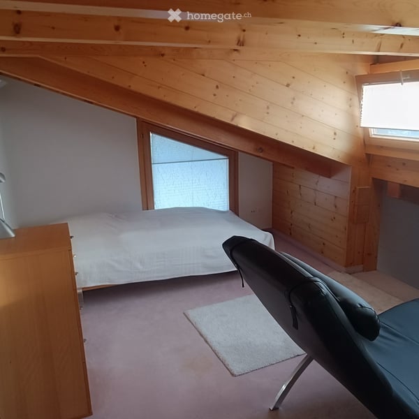 Charmante 3-Zimmer-Dachwohnung mit Balkon und Bergpanorama in Flims Dorf 6