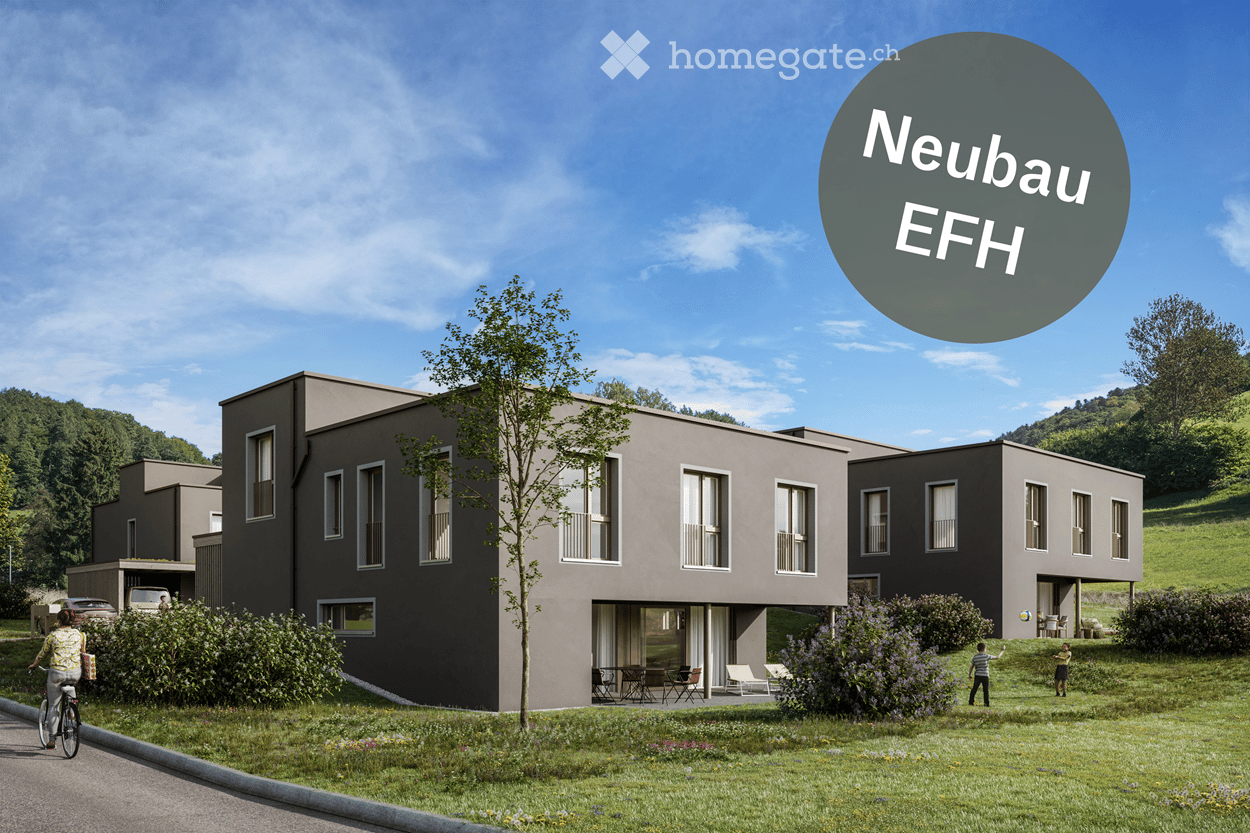 Modern two-story house with grey exterior, large windows, and a small garden area with outdoor seating.